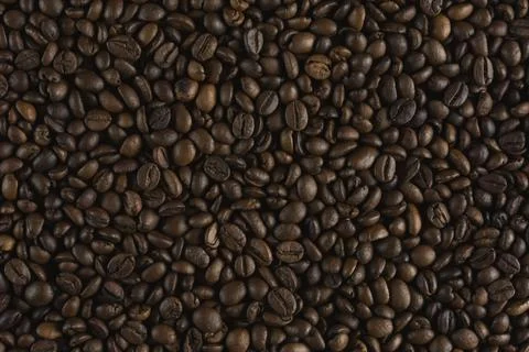 Close-up of roasted coffee beans texture Stock Photos