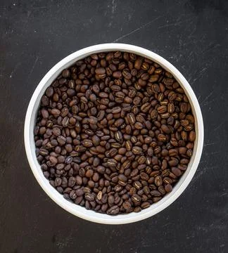 Close up of roasted coffee in black background Stock Photos