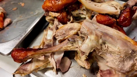 Close-Up of Roasted Duck Carcass and Meat at Thai Street Food Stall Stock Footage 335998814