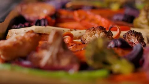 Close Up of Roasted Vegetables Tray for Sunday Roast Stock Footage 325897733