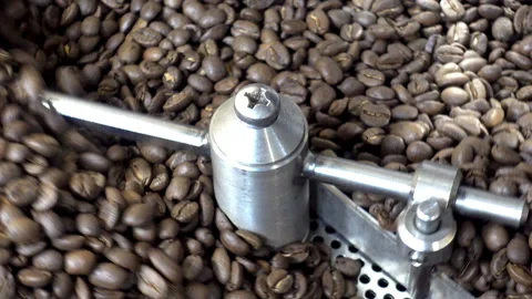 Close-up of roasting of fresh coffee beans. Coffee roasters machine Stock-Footage 88787255