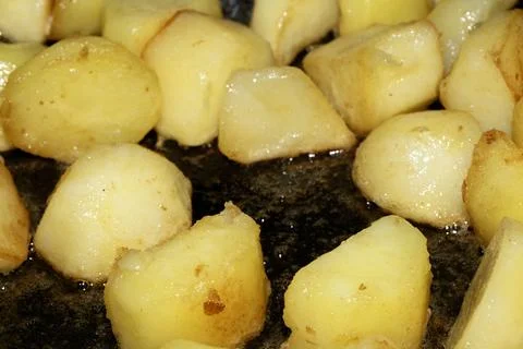 Close up of Roasting Fried Potato Cubes Stock Photos