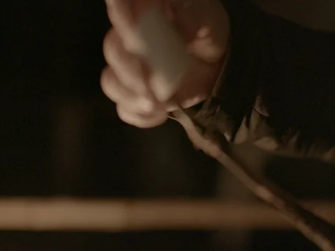 Close Up Roasting Marshmallow Campfire On Stick Stock Footage 76410461