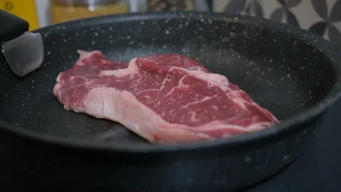 Close up on a roasting rib steak Stock Footage 138900665
