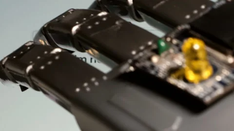 Close-up of a robot hand being tested on a smartphone. Stock Footage 121520875