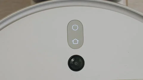 Close Up of Robot Vacuum Power and Home Button with Sensor Stock Footage 320018572