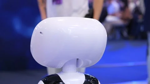 Close-up of robot with white head and black body Stock Footage 344683077