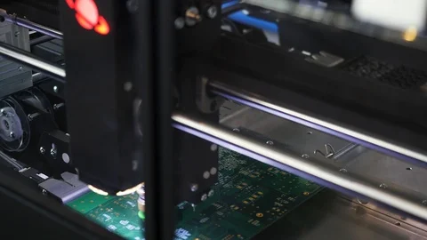 Close up for the robotic mechanism soldering the chip at the computer factory Video stock 113415853