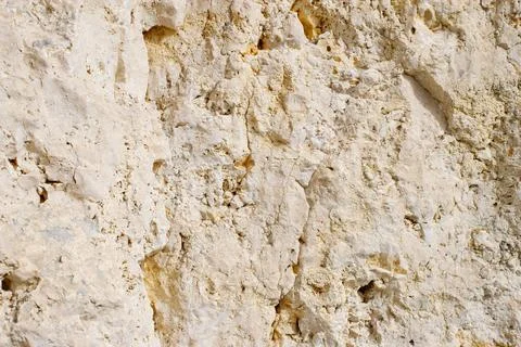 Close-up of a rock backdrop . rock wall with erosion marks. Foto stock