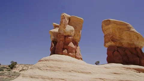A close up of a rock with Devil's Garden in the background Stock-Footage 128836732