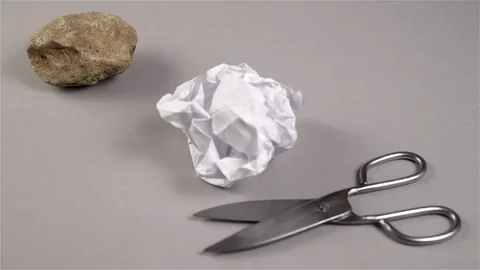 Close up of rock, paper and scissors. Rack focus Stock Footage 71642488