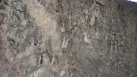 Close up of a rock wall while hiking in apu siqay mountain hike Video stock 145111333
