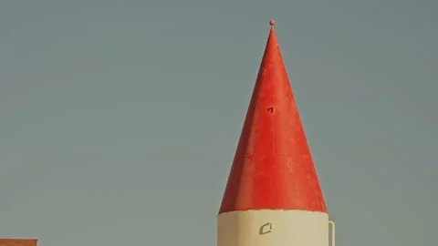 Close up of rocket shaped building against sky 스톡 동영상 326233083