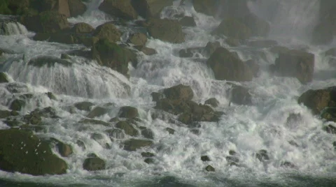 Close-up of the rocks at the bottom of Niagara Falls Stock Footage 365258