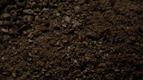 Close up of Rocks Rolling Around as the Ground Rumbles and Shakes Stock Footage 270409907