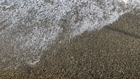 A close up of a rocks with stormy waves Stock Footage 148708608