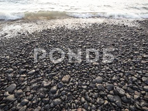 Close Up of Rocky Beach Shoreline Stock Photos