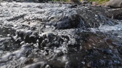 Close Up Rocky River Current with Flowing Water Texture 4K Stock Footage 337060828