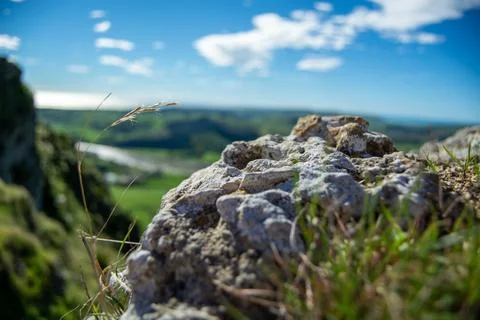 Close-Up of Rocky Surface Overlooking Scenic Landscape Stock Photos