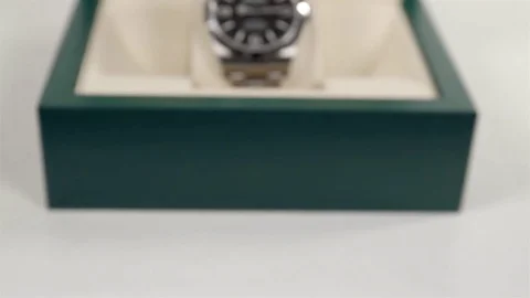 Close Up of a Rolex Oyster Perpetual Explorer inside the original box. Stock Footage 84187906