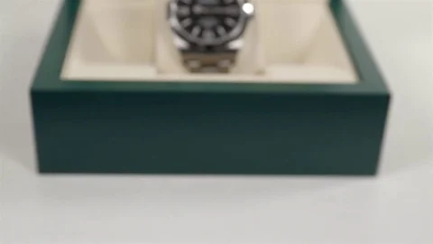 Close Up of a Rolex Oyster Perpetual Explorer inside the original box. Stock Footage 84188024