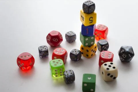 Close up of rolled and stacked game dice Stock Photos