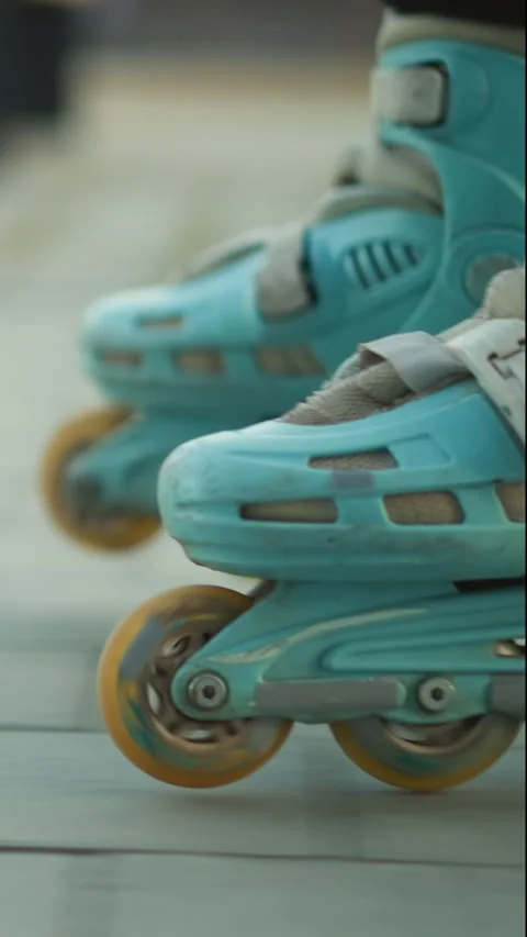 Close-Up of Rollerblade in Motion on Paved Park Path Stock Footage 310493119