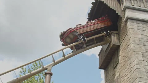 Close up of rollercoaster cart leaving a tower and quickly riding down the Video stock 338071974
