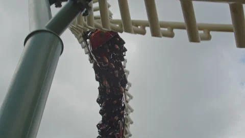 Close up of a rollercoaster rushing by while upside down in the Efteling Video stock 337744953