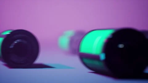 Close-up of rolling alkaline batteries. Modern equipment for better equipmen Stock Footage 256896700