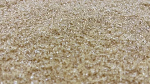Close up rolling of brown sugar texture. Cane sugar as a background Stock Footage 161200814