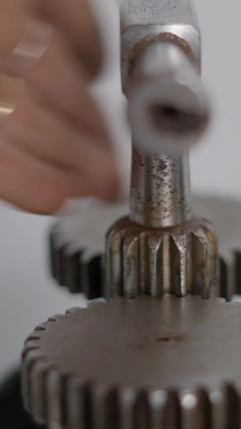 Close Up Of Rolling Mill Machine Lever Turned By Jeweler's Hand. Making Pet Video stock 265956054