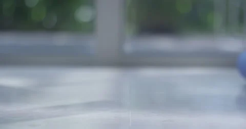 Close up of Rolling Out Blue Yoga or Exercise Mat Stock Footage 172108896