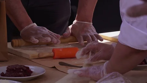 Close-up rolling pin roll out the dough 스톡 동영상 119941275
