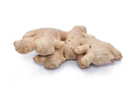 Close up of root ginger isolated on white Stock Photos