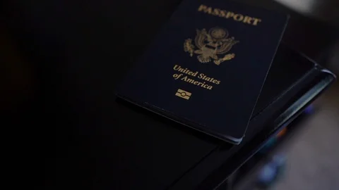 Close Rotate Around American Passport on Dresser Stock Footage