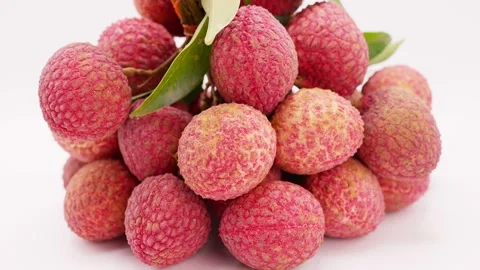 Close Up Rotated Delicious Bunch Lychee On White Background. 4K Slow Motion. 動画素材 196048609