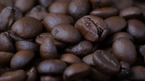 Close-up rotating coffee beans Vídeos de archivo 127634082