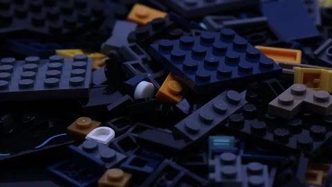 Close-up of a rotating collection of Lego building blocks. Vidéo 333795879