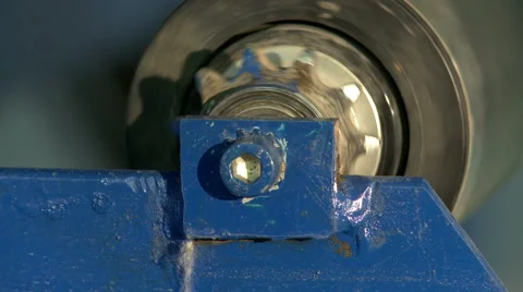 Close-up of rotating cylinder on production machine Video stock 57326154