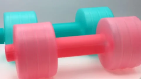 Close-up of a rotating dumbbell Stock Footage 336468259