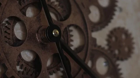 Close-up of the rotating gears of a wall clock. Stock Footage 301254015
