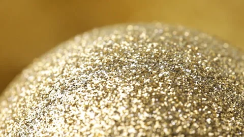 Close up of rotating gold bauble 스톡 동영상 89806875