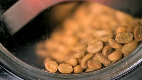 Close-Up: Rotating Green Coffee Beans in Home Roaster, Slow Motion Stock Footage 247660771