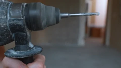 Close up of a rotating hammer drill bit 스톡 동영상 329104273