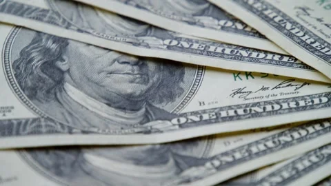 Close-Up Rotating Hundred Dollar Notes Showing Abundance And Economic Security Stock Footage 315352505
