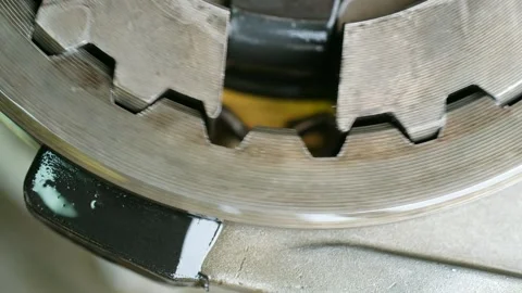 Close up of rotating machine gear mechanism Stock Footage 318511501