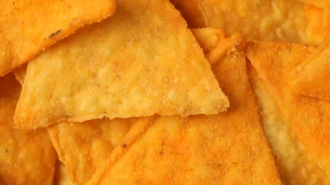 Close up of rotating nacho chips Video stock 89799636