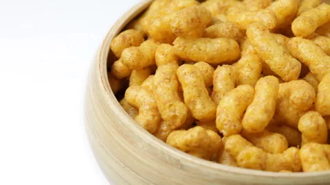 Close up of rotating nut chips in bowl 스톡 동영상 89800300