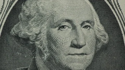 Close-up of a rotating one dollar bill Stock Footage 234213250